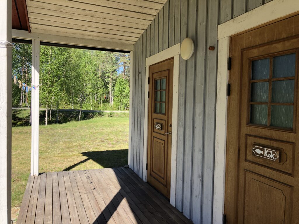 Doors to laundry room and kitchen for fish cleaning